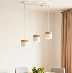 Lampadario cilindrico con base in legno dal design nordico per la sala da pranzo