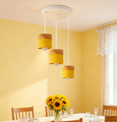 Lampadario cilindrico con base in legno dal design nordico per la sala da pranzo