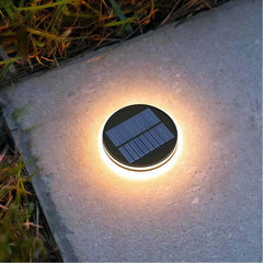 Segnapasso solare LED calpestabile a disco piatto nero con picchetto da terra per terrazzo