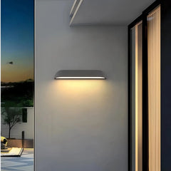 Applique da esterno per facciata in cemento dal design minimalista con LED