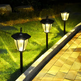 Paletto solare da giardino a lanterna moderna con paralume in vetro e LED