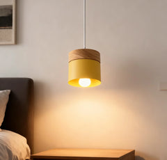 Lampadario cilindrico con base in legno dal design nordico per la sala da pranzo