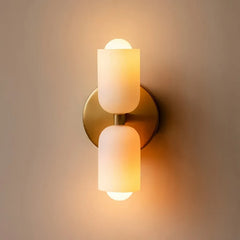 Applique up and down dimmerabile in vetro dal design moderno per comodino