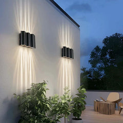 Applique da esterno up down moderno LED in metallo nero con profilo ondulato
