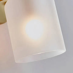 Applique da parete moderna a doppia luce con vetro cilindrico per camera da letto