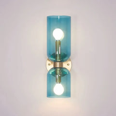 Applique da parete moderna a doppia luce con vetro cilindrico per camera da letto