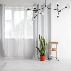 Lampadario a bracci moderno orientabile in vetro nero per soggiorno