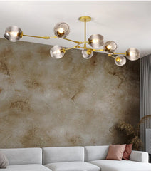 Lampadario a bracci moderno orientabile in vetro oro a più luci per soggiorno