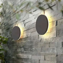 Applique da esterno rotonde a LED in metallo dal design minimalista