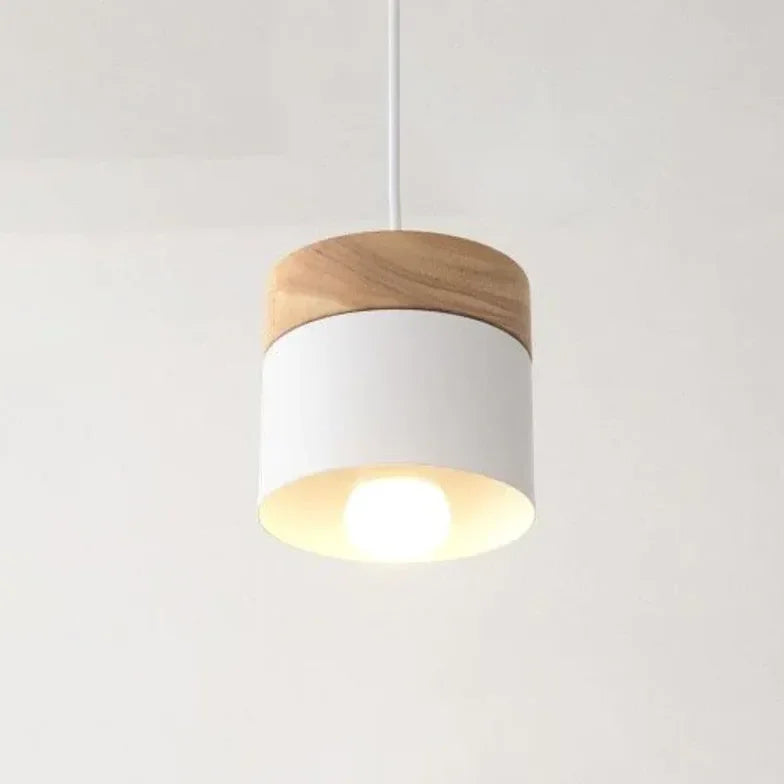 Lampadario cilindrico con base in legno dal design nordico per la sala da pranzo