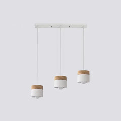 Lampadario cilindrico con base in legno dal design nordico per la sala da pranzo