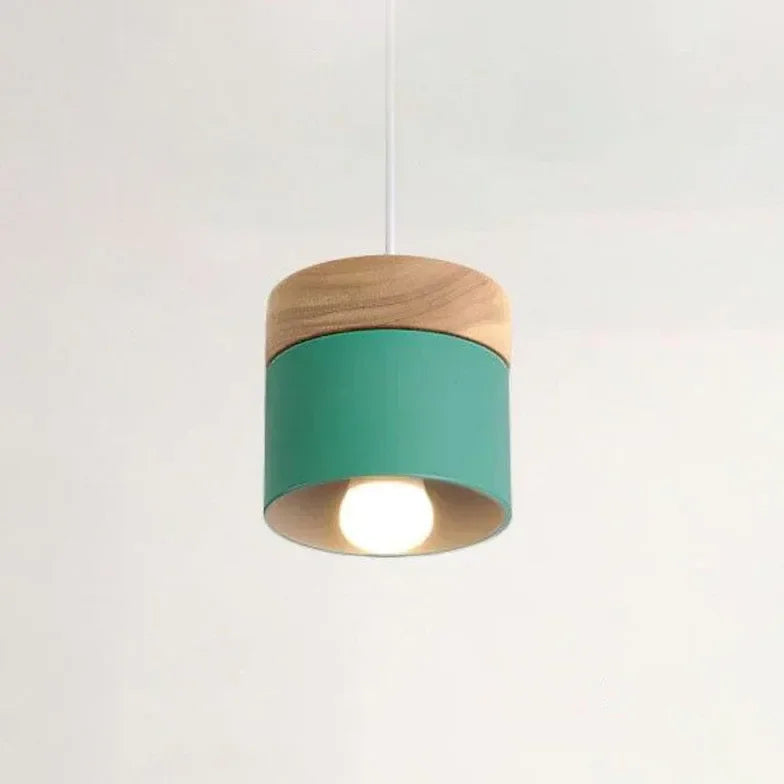 Lampadario cilindrico con base in legno dal design nordico per la sala da pranzo