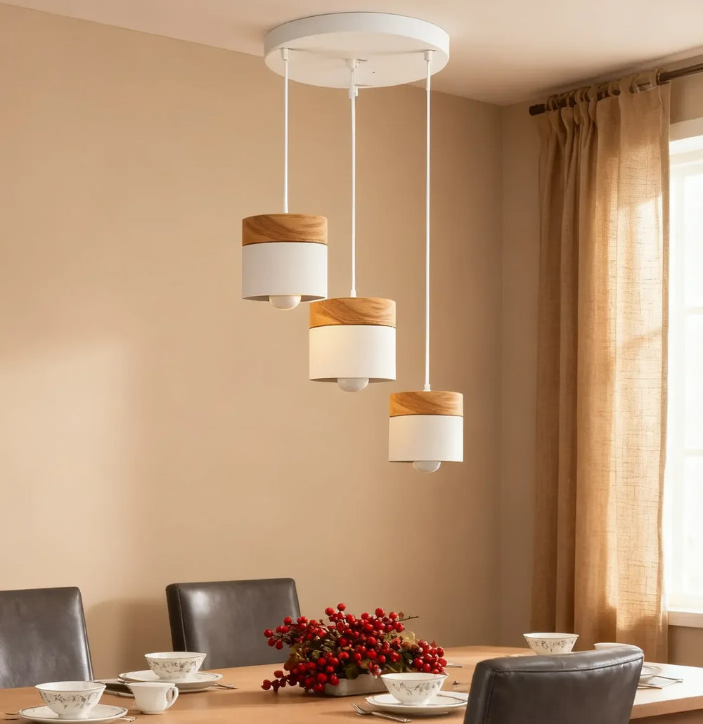 Lampadario cilindrico con base in legno dal design nordico per la sala da pranzo