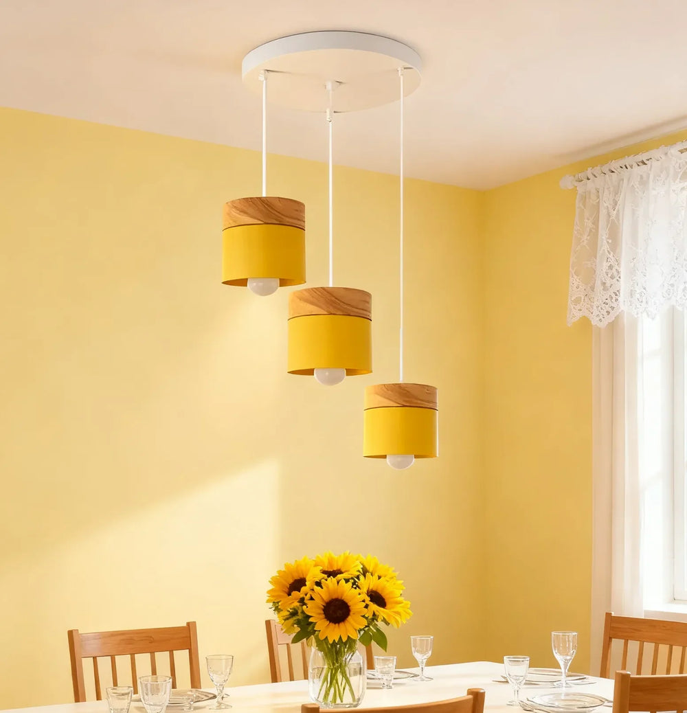 Lampadario cilindrico con base in legno dal design nordico per la sala da pranzo
