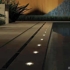 Segnapasso LED esterno calpestabile 24V da incasso rotondo design minimal per terrazzo
