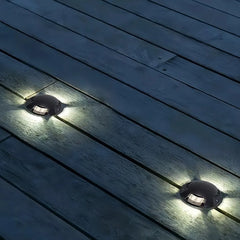 Segnapasso calpestabile esterno LED rotondo nero moderno con effetto luminoso
