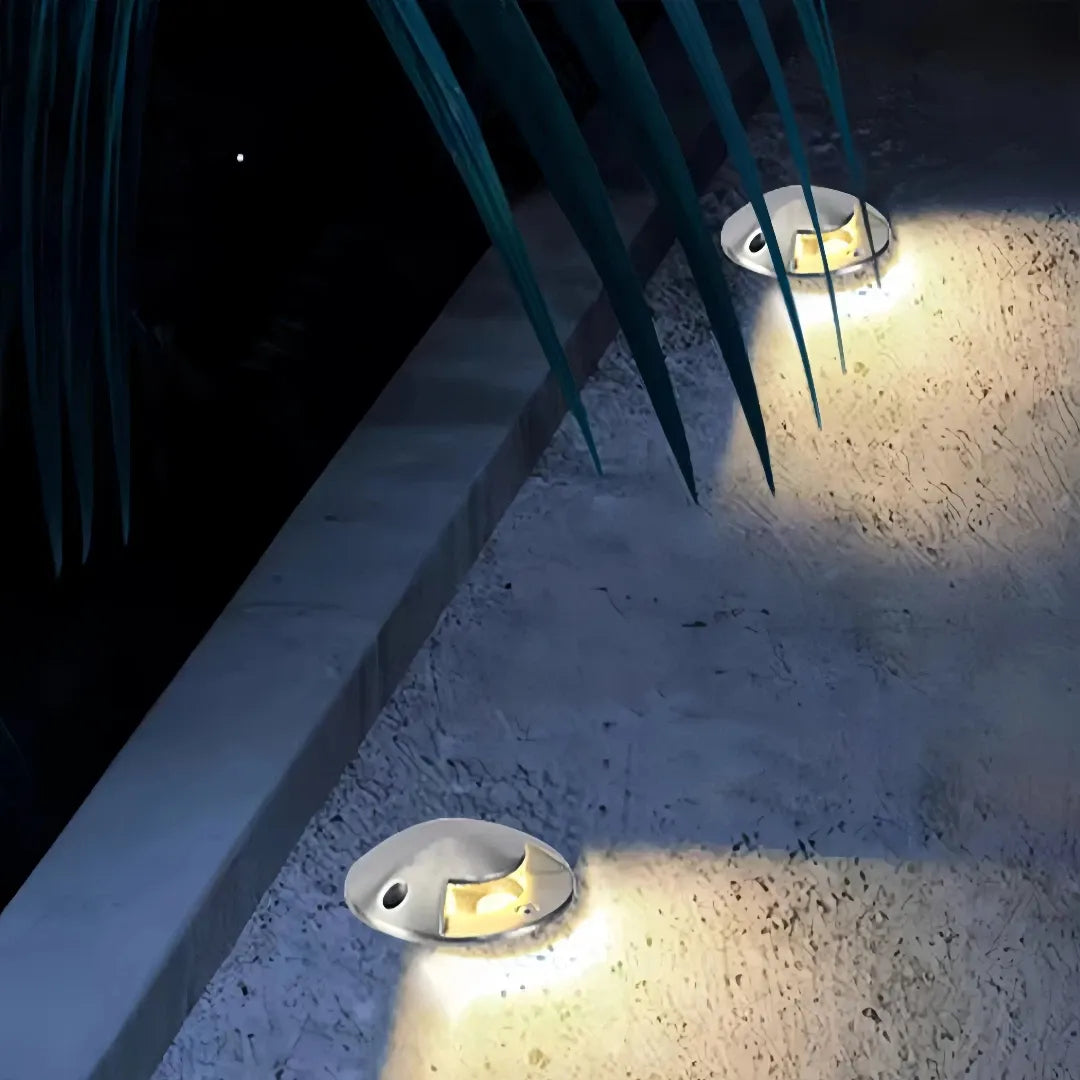 Segnapasso LED calpestabile in acciaio inox moderno a effetto luminoso per terrazzo