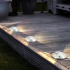 Segnapasso LED calpestabile in acciaio inox moderno a effetto luminoso per terrazzo