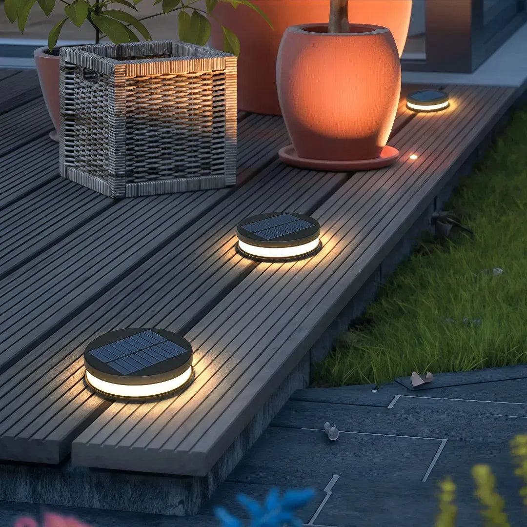 Segnapasso solare LED calpestabile a disco piatto nero con picchetto da terra per terrazzo
