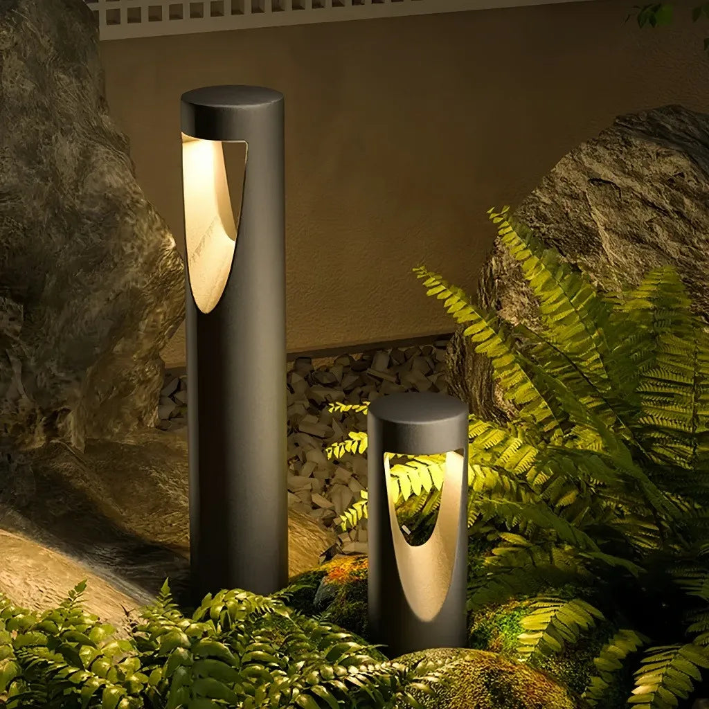 Paletto LED da giardino cilindrico in metallo nero dal design moderno
