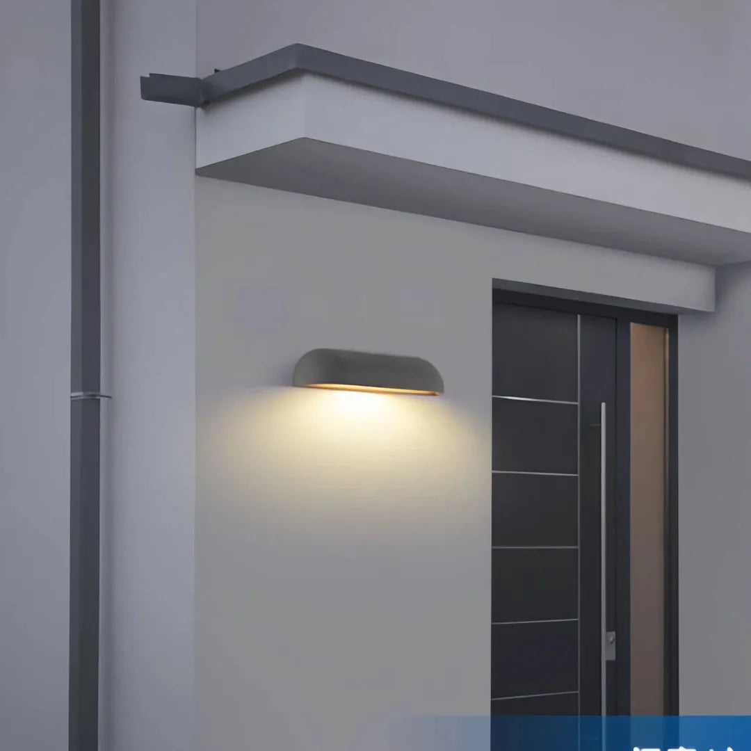 Applique da esterno per facciata in cemento dal design minimalista con LED