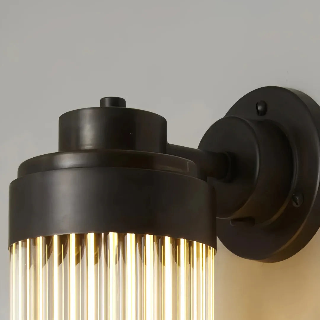Applique per esterno a LED moderna cilindrica nera con vetro scanalato