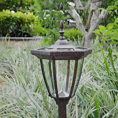 Paletto solare da giardino a lanterna moderna con paralume in vetro e LED