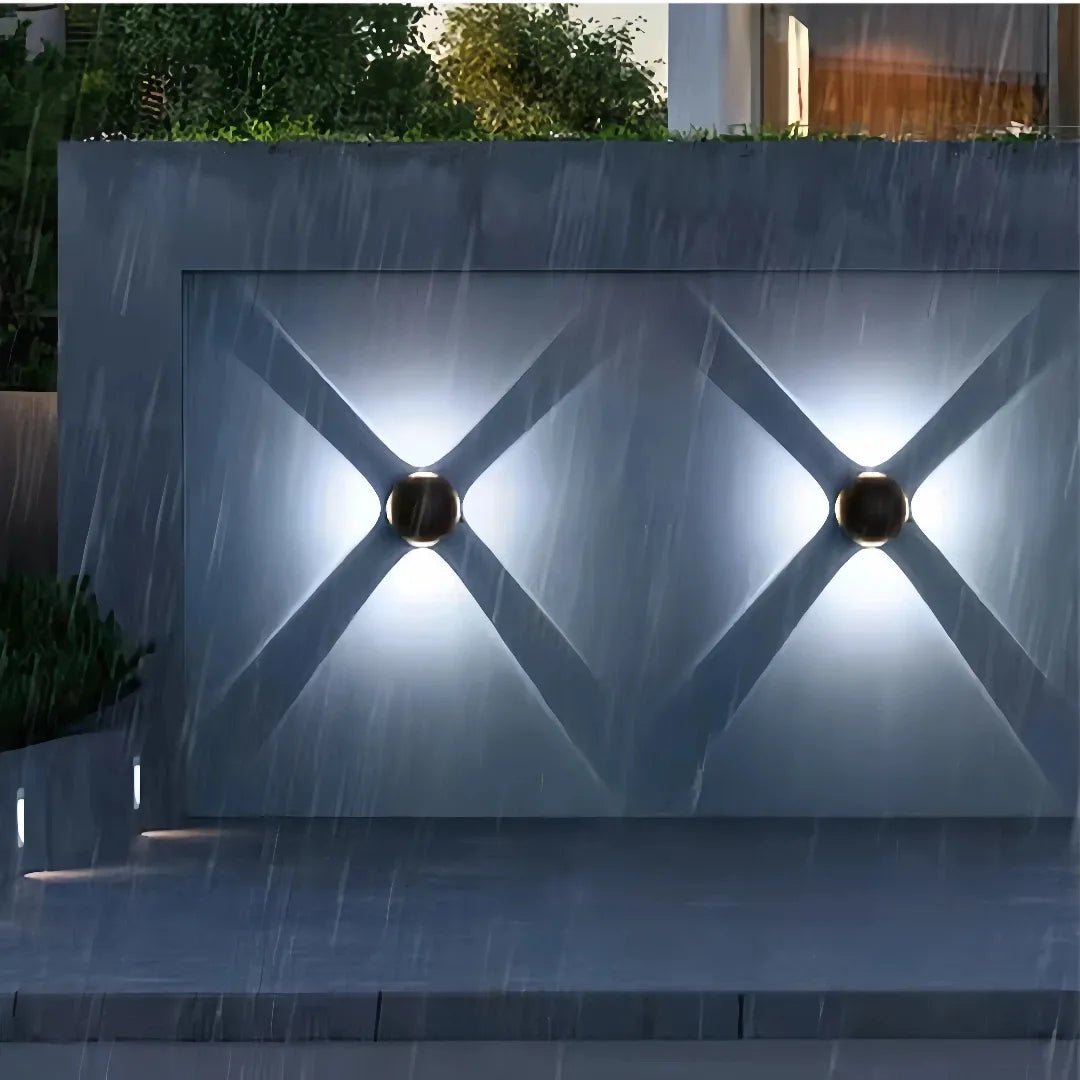 Applique per esterno con intersezione di fasci luminosi LED design moderno a sfera per balcone