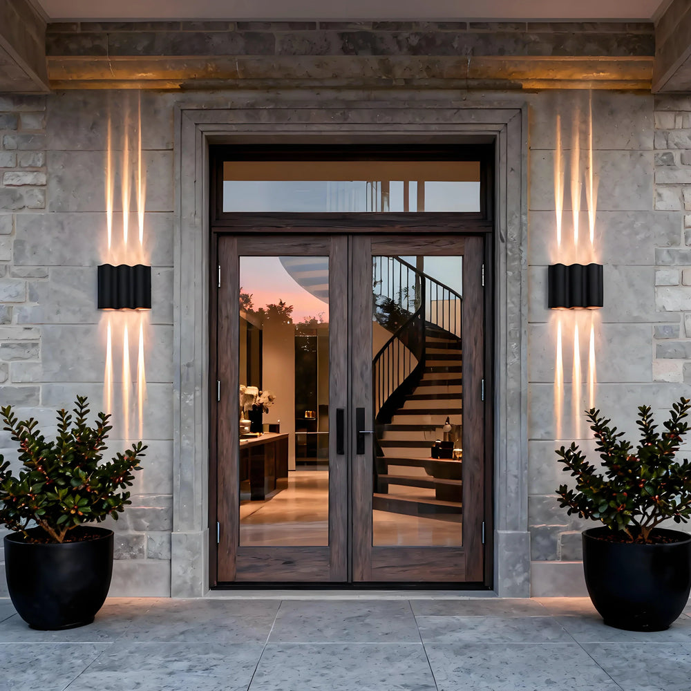 Applique da esterno up down moderno LED in metallo nero con profilo ondulato