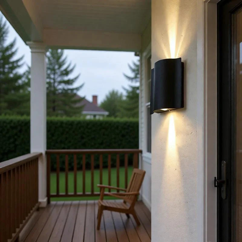 Applique da esterno up down moderno LED in metallo nero con profilo ondulato