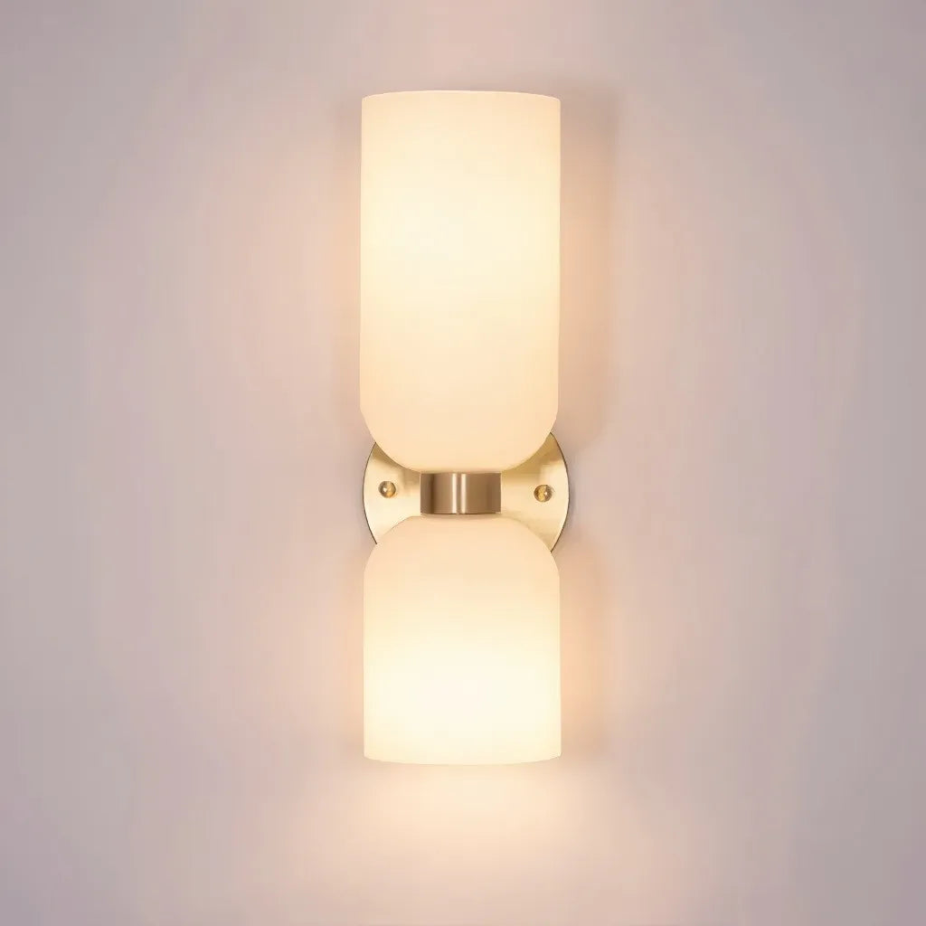 Applique da parete moderna a doppia luce con vetro cilindrico per camera da letto