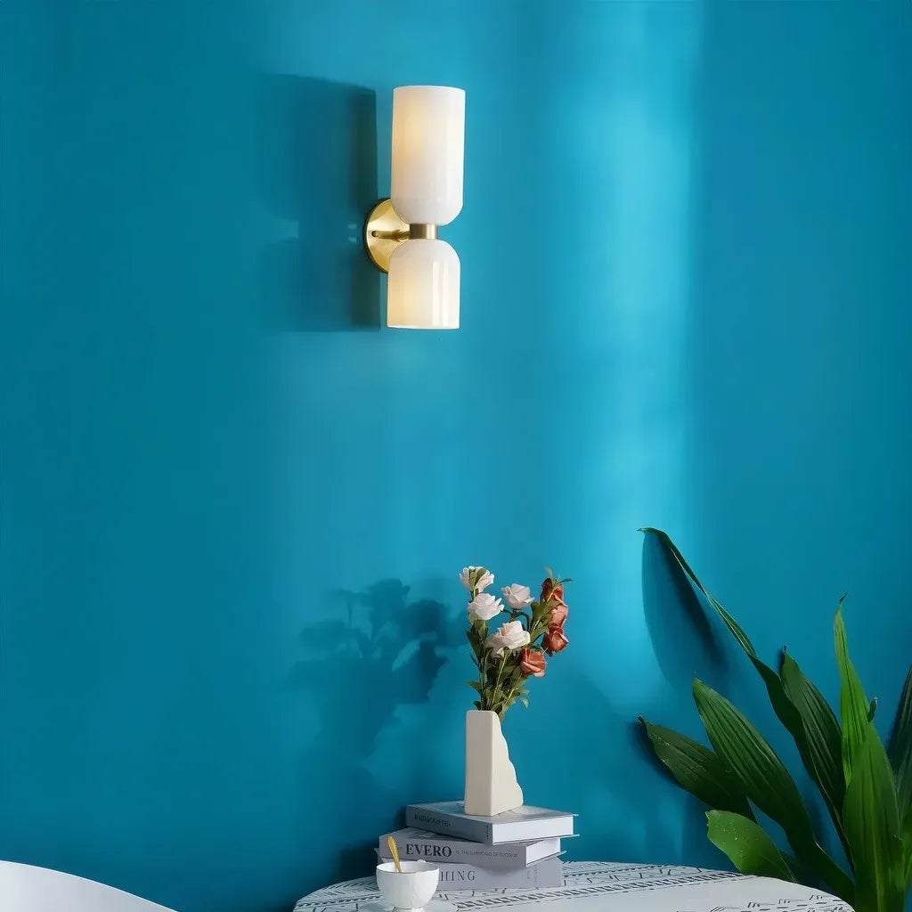 Applique da parete moderna a doppia luce con vetro cilindrico per camera da letto