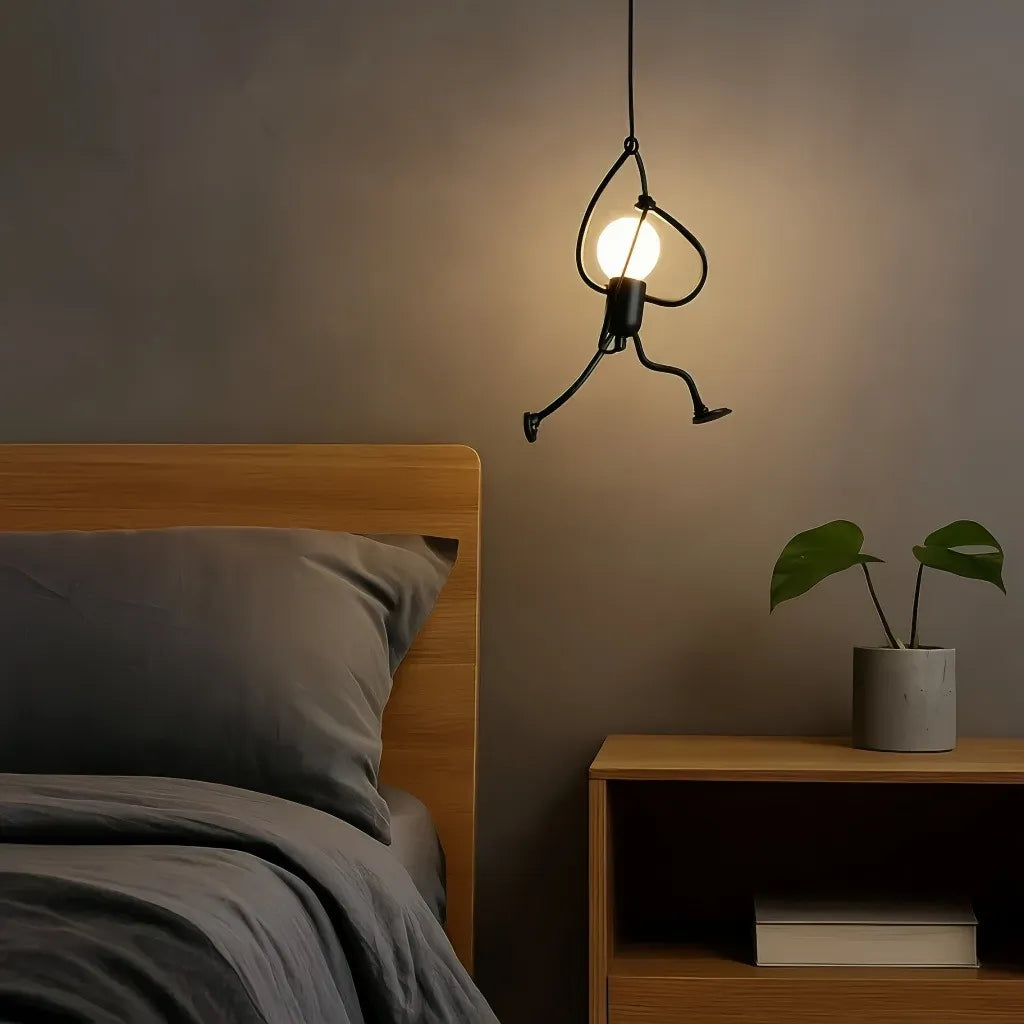 Lampada a sospensione moderna in ferro con figura umana stilizzata per camera da letto